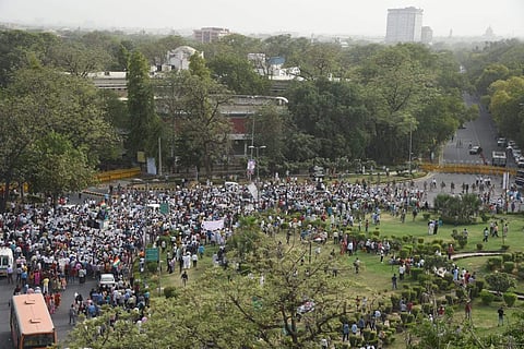Large number of AAP supporters seen gathering for the silent March from Mandi house to pm house in New Delhi on Sunday. Photo by Parveen Negi