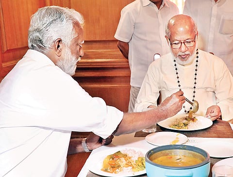 Mizoram Governor Kummanam Rajasekharan serving food to Cardinal Mar George Alenchery when the latter called on him at the Government Guest House in Kochi on Tuesday | Melton Antony