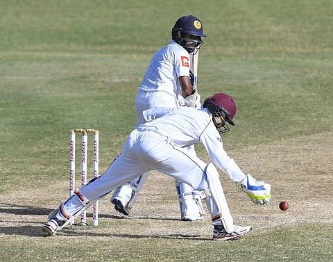 Niroshan Dickwella (L) will continue the Sri Lankan effort on the third day. (File | AFP)