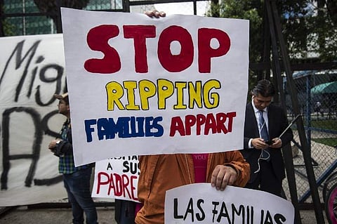 People taking part in a protest against Trump's immigration policies. (File| AFP)