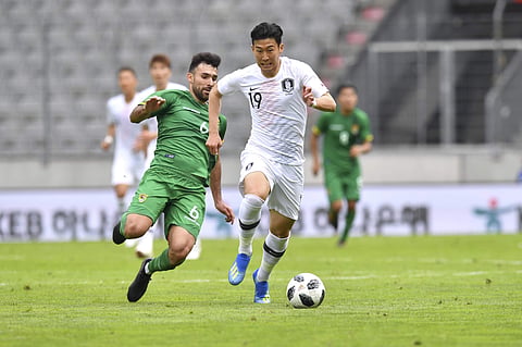 South Korea's Son Heung-min, right, and Bolivia's Danny Bejarano challenge for the ball during the friendly match at the Tivoli Stadium in Innsbruck, Austria | AP