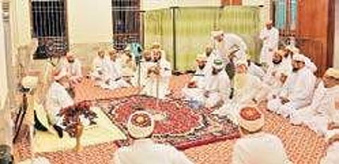 Bohra Muslims in mosque for the morning prayer