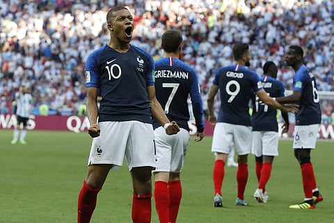 France's Kylian Mbappe celebrates after scoring his side's third goal during the round of 16 match between France and Argentina, at the 2018 soccer World Cup at the Kazan Arena in Kazan, Russia, Saturday, June 30, 2018. | AP