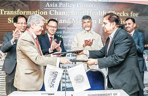 LKY School of Public Policy and AP government exchanging MoU in the presence of CM N Chandrababu Naidu at Lee Kuan University in Singapore on Monday