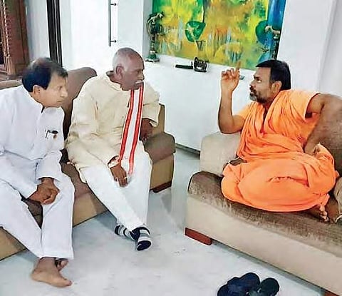 BJP MP Bandaru Dattatreya and MLA Chintala Ramachandra Reddy at the residence of Swamy Paripoornananda, at Jubilee Hills in Hyderabad on Tuesday | Express