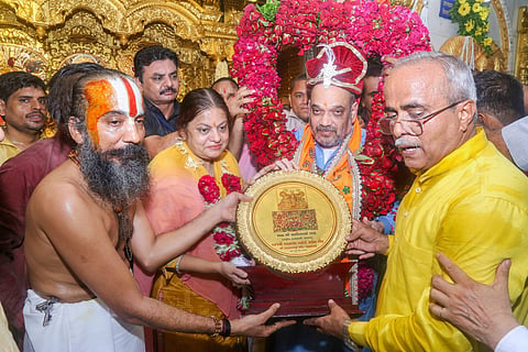 Ahmedabad BJP National President Amit Shah offer prayers at Lord Jagganath temple during the annual 141st Rath Yatra in Ahmedabad on Saturday July 14 2018. (PTI)