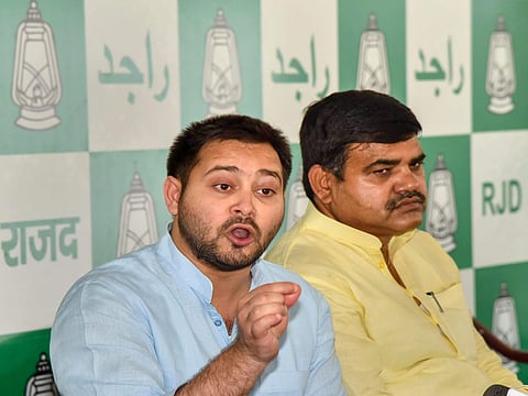 RJD leader Tejashwi Yadav speak to the media during a press conference in Patna. (File Photo | PTI)