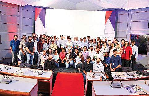 The 25 startup finalists of the Global Impact Challenge, jointly organised by the Kerala Startup Mission and the US-based Singularity University, with M Sivasankar, IT secretary, at Technopark