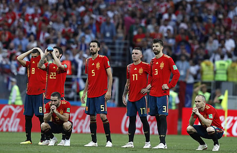 Spanish players react after their loss in the penalty shootout against Russia. (Photo | AP)