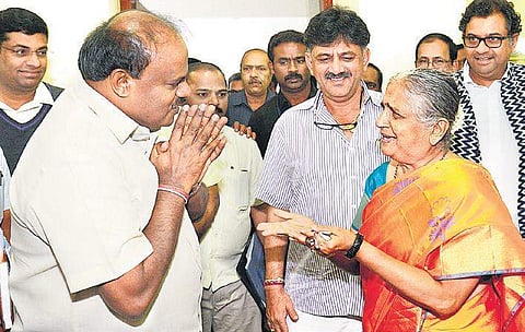 Chief Minister H D Kumaraswamy greets Infosys Foundation Chairperson Sudha Murty in Bengaluru on Thrusday | Pushkar V