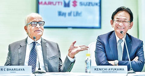 Maruti Suzuki India Chairman R C Bhargava with CEO Kenichi Ayukawa. ( Photo | PTI )