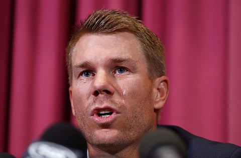 David Warner (in pic) and captain Steve Smith were banned for 12 months while young batsman Cameron Bancroft received 9 months after an investigation into the Australian cricket team's cheating scandal identified Warner as the instigator of the ball tampe
