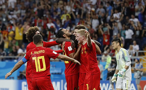 Belgium's Nacer Chadli, center celebrates with teammates after scoring his third side's goal during the round of 16 match between Belgium and Japan at the 2018 soccer World Cup in the Rostov Arena. | AP