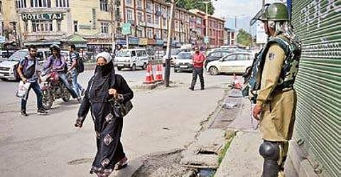 A security personnel on guard in Srinagar on Thursday, two days ahead of slain terrorist Burhan Wani’s death anniversary | PTI