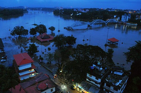 The Aluva Shiva Temple which was under water earlier is now slowly getting visible on Sunday evening after the water levels in Periyar river receded. (Photo | A Sanesh/EPS)