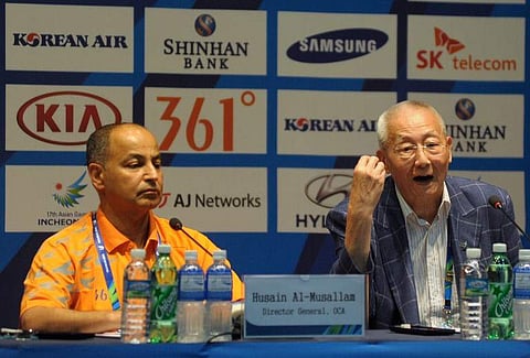 OCA director general Husain Al Musallam, left. (File Photo | AP)