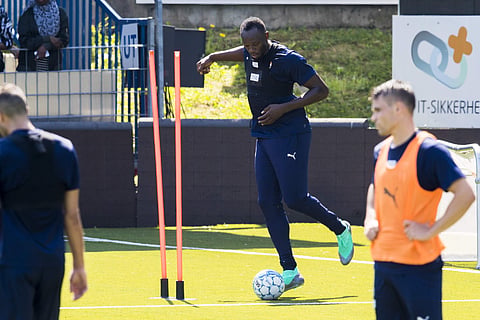 Usain Bolt participates in a football training session. ( Photo | AP)