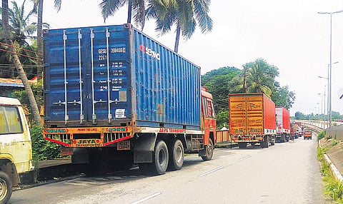 Container trucks stuck on the Palakkad-Thrissur national highway for the past two days | EXPRESS