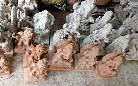 Ganesha idols that look like clay, but made of PoP mixed red oxide | Express