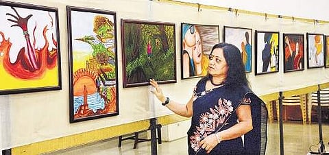 Artist Anitha Mohan has displayed 20 paintings at musuem auditorium paying homage to the Latvian woman who was murdered in Kovalam Vincent Pulickal
