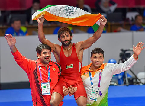 India's wrestler Bajrang Punia reacts after his semi-final victory. (Photo | PTI)
