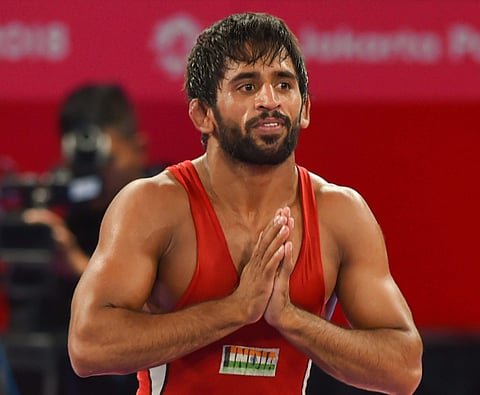 ndia's wrestler Bajrang Punia reacts after his semi-final victory. (Photo | PTI)