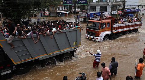 Stranded people being evacuated and shifted to relief camps in Taurus, Tata Tippers at Thottumugham near Aluva (Photo | EPS/Melton Antony)