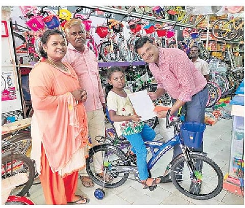 Hero Cycles’ South India sales officer Manojkumar gifting Anupriya with a bicycle | Express