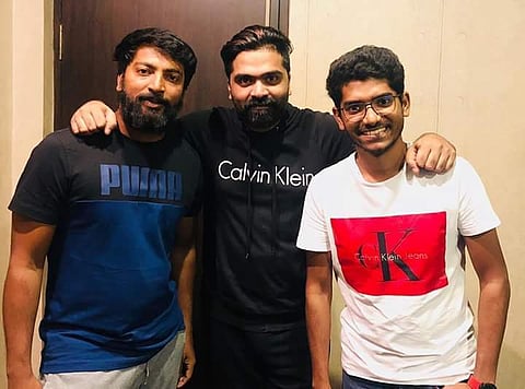 Simbu with Kalaiyarasan (L) and Nivas K Prasanna (R)