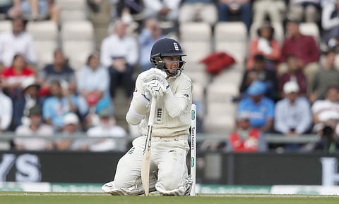 England's Sam Curran looks up after falling over after he attempted to play a ball | AP