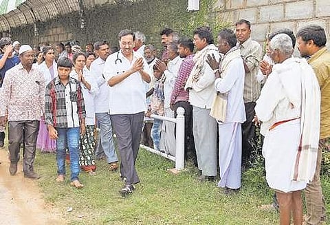 Dr Ramana Rao with patients at his free clinic in rural Karnataka Nagaraja Gadekal