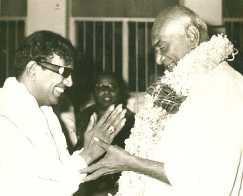 File photo of then Chief Minister M Karunanidhi felicitating Congress leader and former Chief Minister K Kamaraj. (EPS)