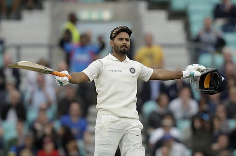 India wicketkeeper Rishabh Pant celebrates his century during the fifth cricket test match of a five match series between England and India at the Oval cricket ground in London. (Photo | AP)
