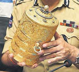 The golden tiffin box retrieved from the burglars | R Satish Babu