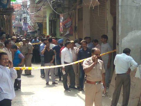 Police personnel in front of the house, in which 11 dead bodies were found in Sant Nagar in north Delhi's Burari. (Photo | File/EPS)