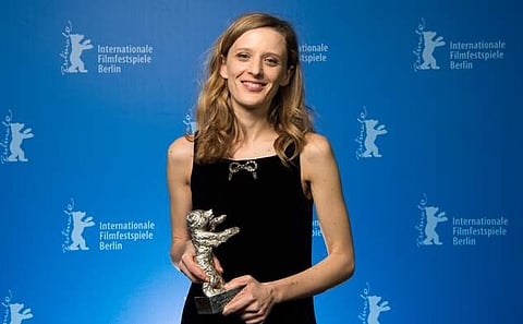 Mia Hansen-Love shows off a Silver Bear as best director for the film 'L'avenir' during the award ceremony of the 2016 Berlin Film Festival (Photo | AP)