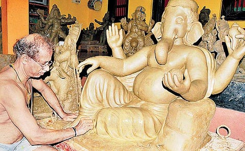 Suresh Bhandari at a clay Ganesha workshop in Karki;