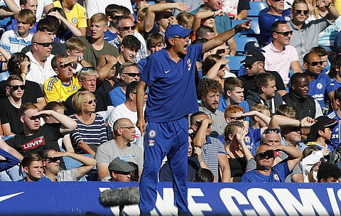 Chelsea's team manager Maurizio Sarri gestures during the English Premier League soccer match between Chelsea and Bournemouth at Stamford Bridge stadium in London, Saturday, Sept. 1, 2018. | AP