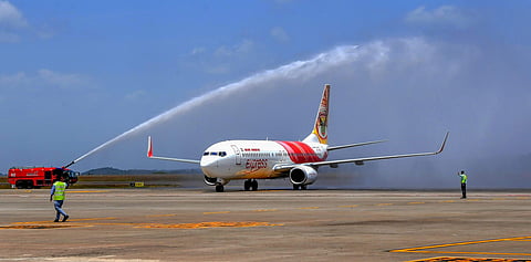 An Air India trial flight being accorded water salute after its successful landing at Kannur International Airport Thursday Sep 20 2018. | PTI