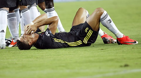 Juventus forward Cristiano Ronaldo reacts after receiving a red card during the Champions League, group H soccer match between Valencia and Juventus, at the Mestalla stadium in Valencia, Spain, Wednesday, Sept. 19, 2018. | AP