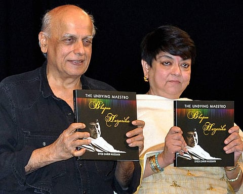 Bollywood director Mahesh Bhatt and Kalpana Lajmi releasing a book 'The Undying Maestro Bhupen Hazarika', written by Syed Zarir Hussain in Guwahati. (File | PTI)