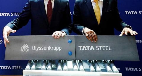 Germany's ThyssenKrupp CEO Heinrich Hiesinger and Chairman of Tata Steel Natarajan Chandrasekaran pose at a joint news conference after signing a final agreement on Saturday to establish a long-expected steel joint venture, in Brussels. (Photo | REUTERS)