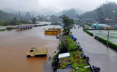 In this 14 August 2018 file photo, Munnar town is flooded after the shutters of the Mattuppetty dam were opened. (Photo | EPS)