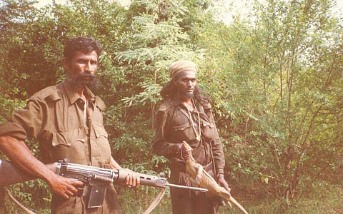 Slained smuggler Veerappan (L) (File | EPS)
