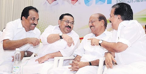 UDF convener Benny Behanan having a chat with Opposition Leader Ramesh Chennithala during the UDF Parliament constituney conference held in Kochi on Tuesday. Former KPCC president M M Hassan and IUML leader P K Kuhalikkutty also seen | A Sanesh