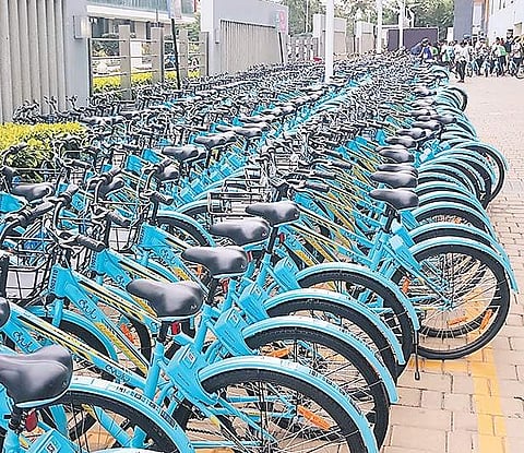 Yulu cycles parked at a Metro station in the city
