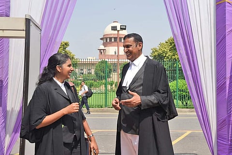Lawyers Kaleeswaram Raj and Thulasi K Raj leave after the Supreme Court verdict on adultery law in New Delhi Thursday September 27 2018.( Photo | Parveen Negi/ EPS)