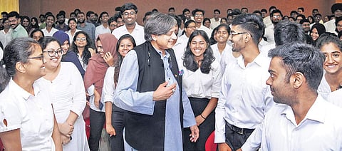 Shashi Tharoor MP interacting with the students of National University of Advanced Legal Studies, at Kalamassery on Friday |A Sanesh