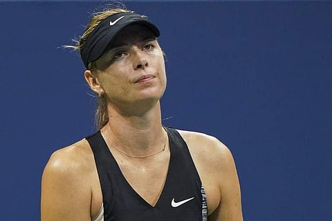 Russia's Maria Sharapova reacts after losing a point to Spain's Carla Suarez Navarro during their 2018 US Open Women's Singles tennis match. (Photo | AFP)
