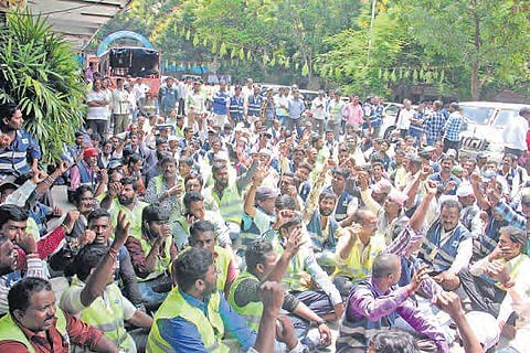 Workers protest demanding equal pay for equal work, in front of the GHMC head office, on Wednesday in Hyderabad | Sathya keerthi